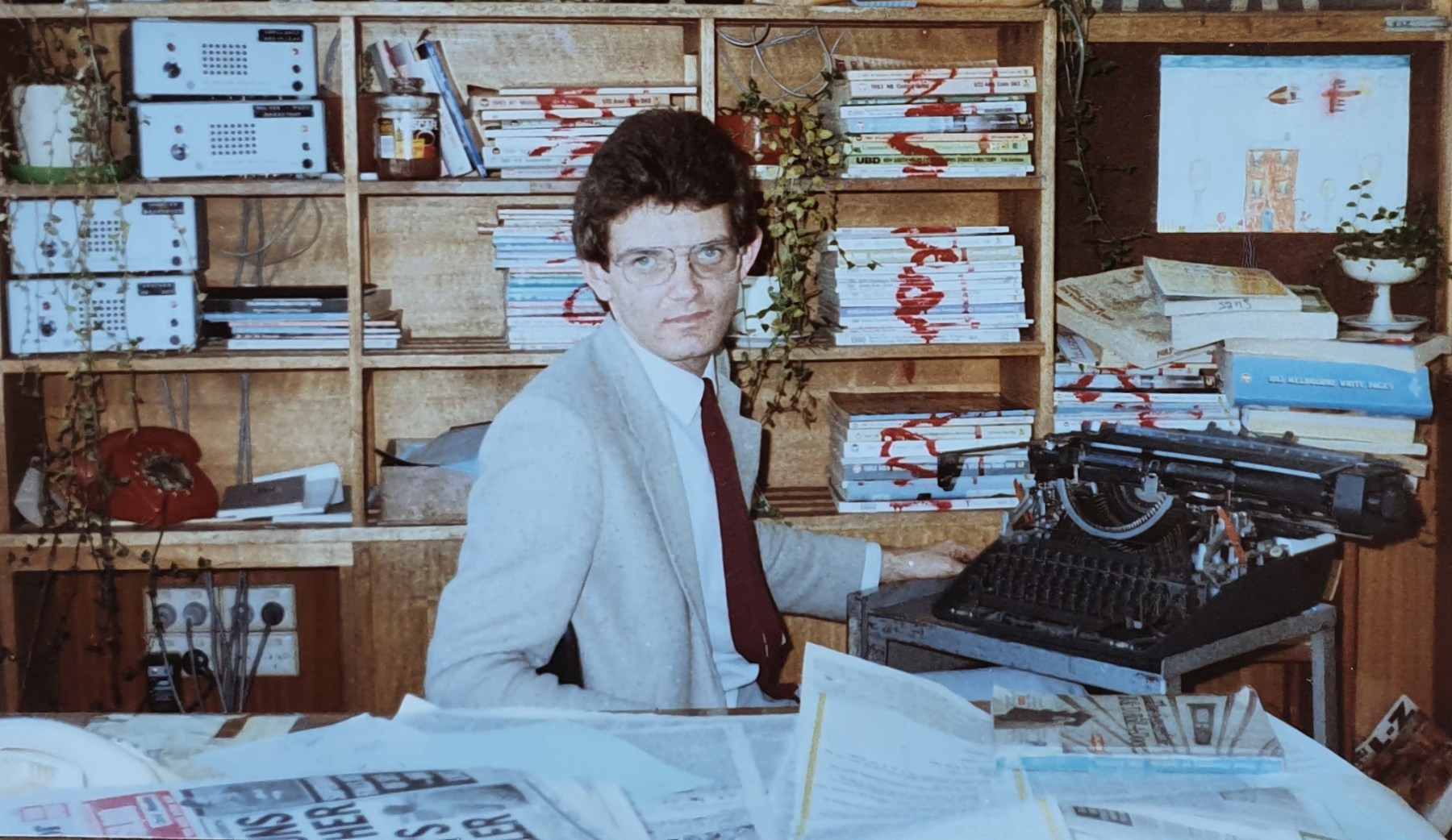 Back in 1984: Peter Martin in the ABC radio news “dog box” at William Street where police, ambulance and fire service radios were monitored.