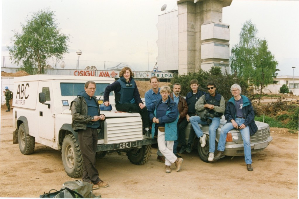 l-r: ABC%E2%80%99s Jonathan Holmes, CBC reporter Anna Marie Tremonti, ABC%E2%80%99s Max Uechtritz and David Fraser (sound), two unidentified media personnel, and cameramen Bartley Price of abc America and ABC Australia's Mick Fanning, Bosnia, 1993