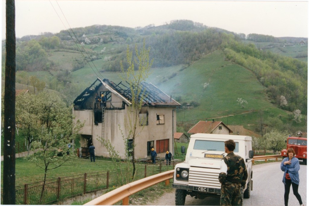 The aftermath of ‘ethnic cleansing’: the Hog and crew at a burning house, Bosnia, 1993
