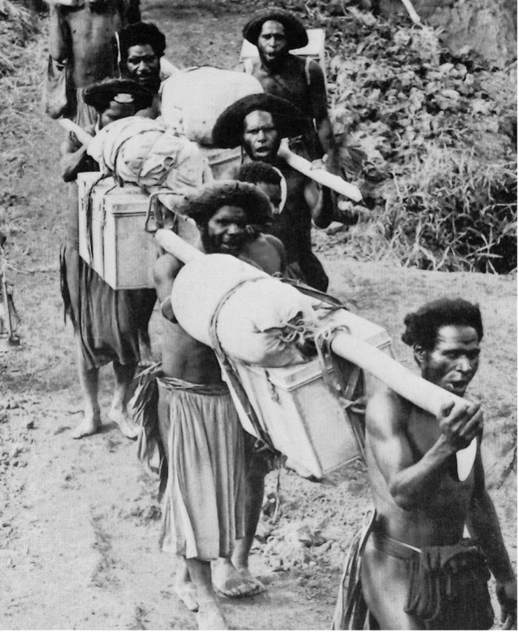 Carrier line of New Guinea porters on the Kokoda Track during WWII.