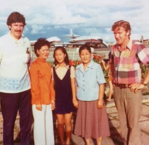 John Tulloh (far left) and Neil Davis (far right) in Seoul, South Korea, with the family of then missing Korean cameraman Lee Yosep. A freelance cameraman who worked for Visnews, Lee was held for 15 days in 1970 by anti-government forces in Cambodia before being released. JT ensured that Lee was well looked after, including financially.