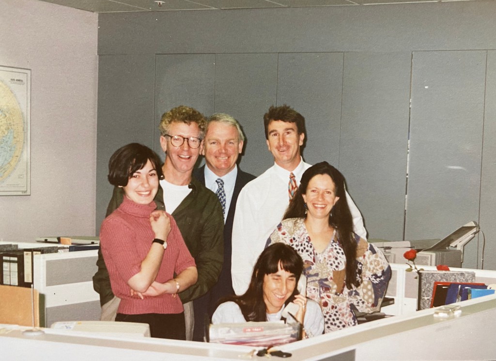 A happy team: Elaine Cooke, on the phone, with (L-R) Stergitsa Zamagias, Peter Morton, MD David Hill, John Coghlan and Annie McCaig.