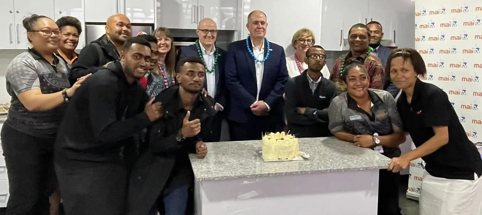 The ABC delegation with the team from Mai TV in Suva, Fiji, September 2022. L-R at centre back are: Jo Elsom, Mark Tapley, David Anderson, Claire Gorman and CEO of Mai TV Stanley Simpson (in patterned shirt, green beads).