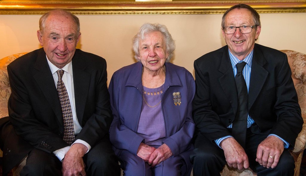 Dorothy and her sons Gavin and Phil, who recall having to be quiet while she taped the newsreader voiceover of her stories as they aired on television